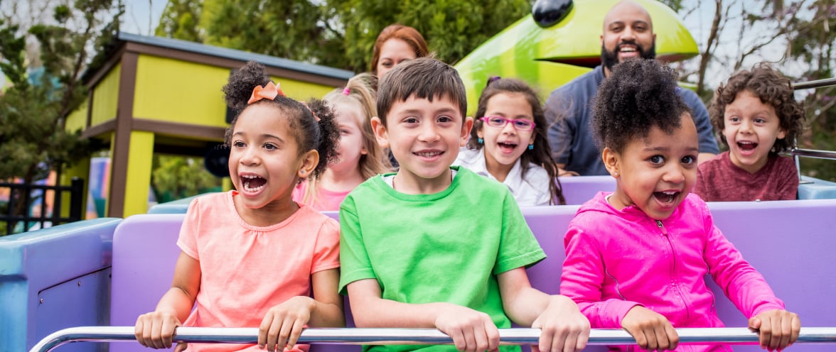 Children riding Oscars Whirly Worms