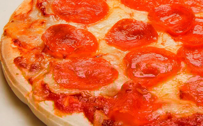 Eat pizza at La Cucina
