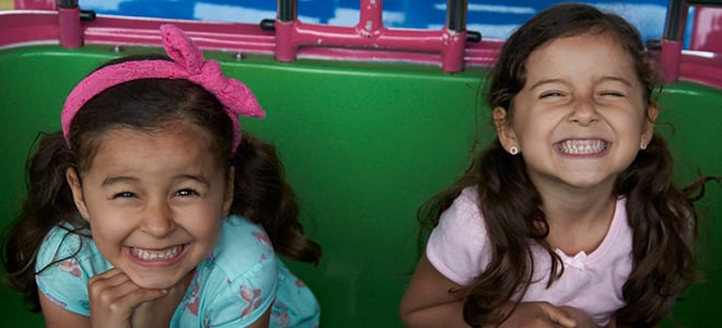Sisters smiling at Busch Gardens Williamsburg